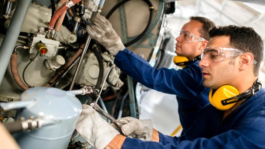 Multiple of workers in manufacturing.