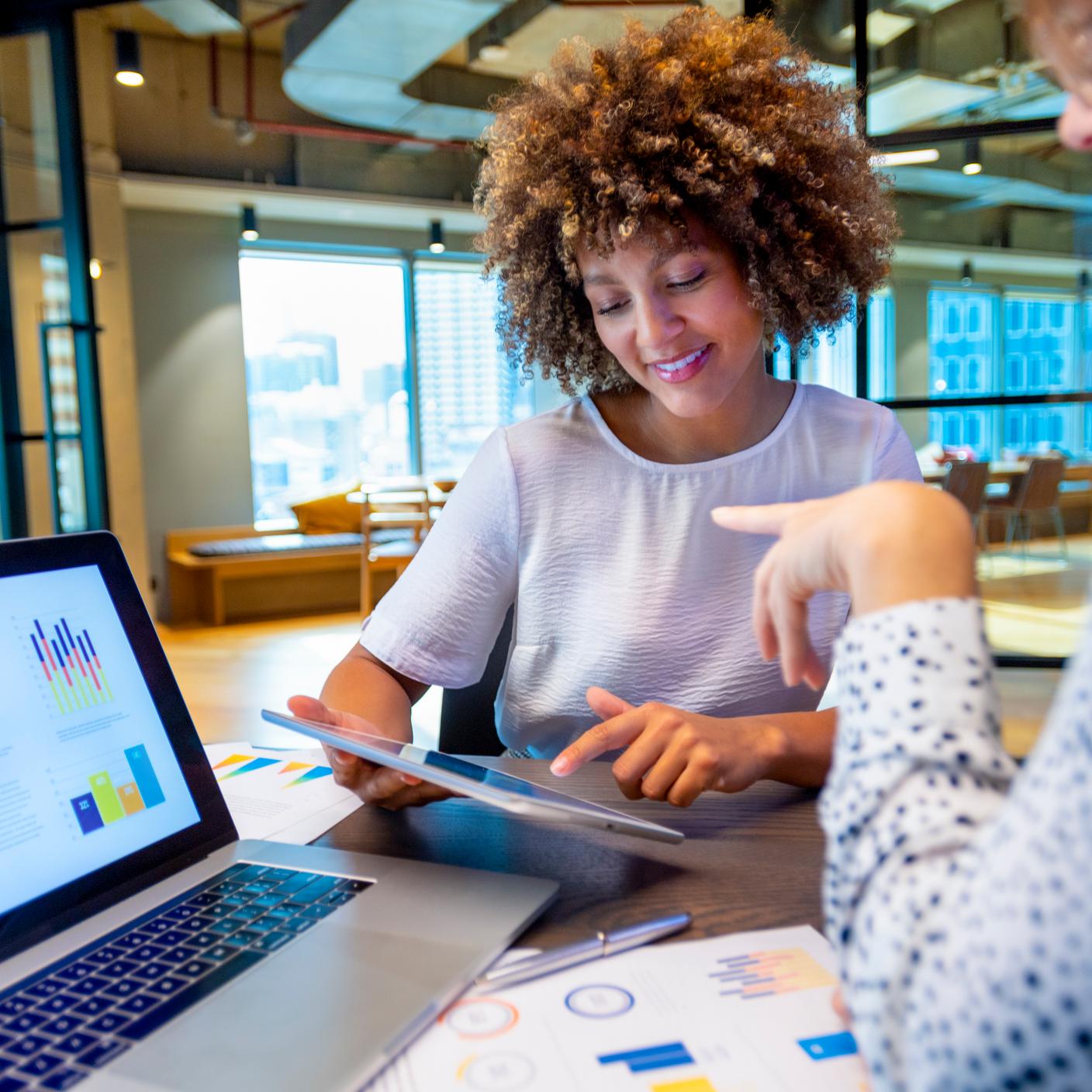 Women looking at tablet 