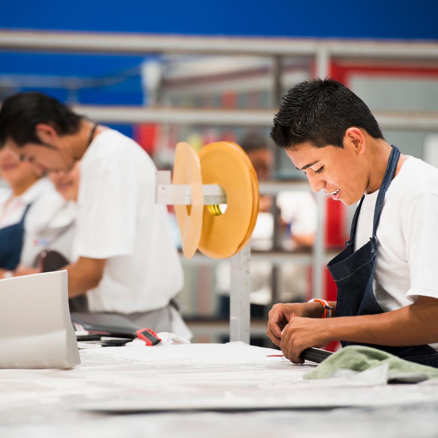 Workers in manufacturing plant
