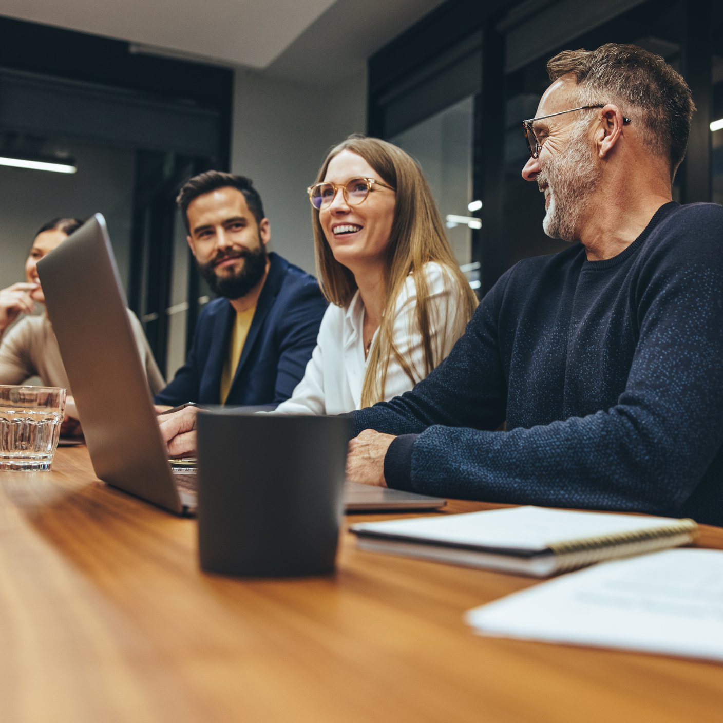  Business people having a briefing in a boardroom